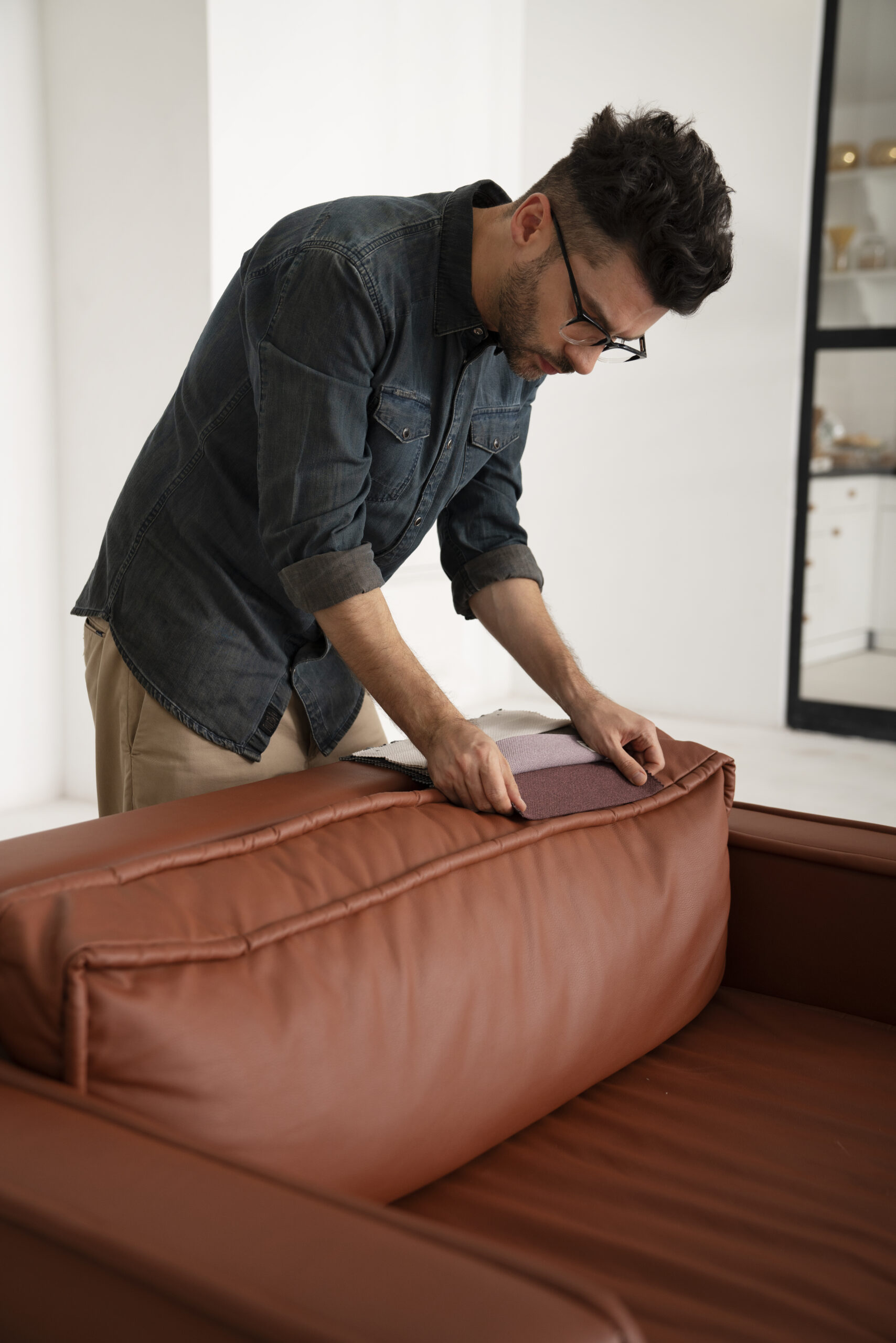 side view man working design project